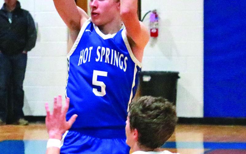 Hot Springs senior Matt Close looks to make a pass last month during the West River Tournament versus Upton. Photo by Brett Nachtigall