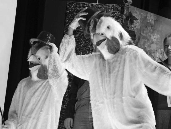 Edgemont students Landon Harrod and Treyan Urban appear as chickens on stage at the recent EHS production of the play Artist’s Retreat. Photos by Chris Sawyer