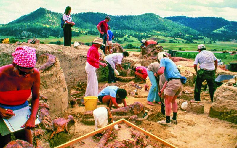 Excavators work to uncover mammoth bones during the early days of The Mammoth Site of Hot Springs, South Dakota. This week, the attraction and scientific site is celebrating its 50th anniversary with two celebrations on Friday and Saturday, June 21-22.