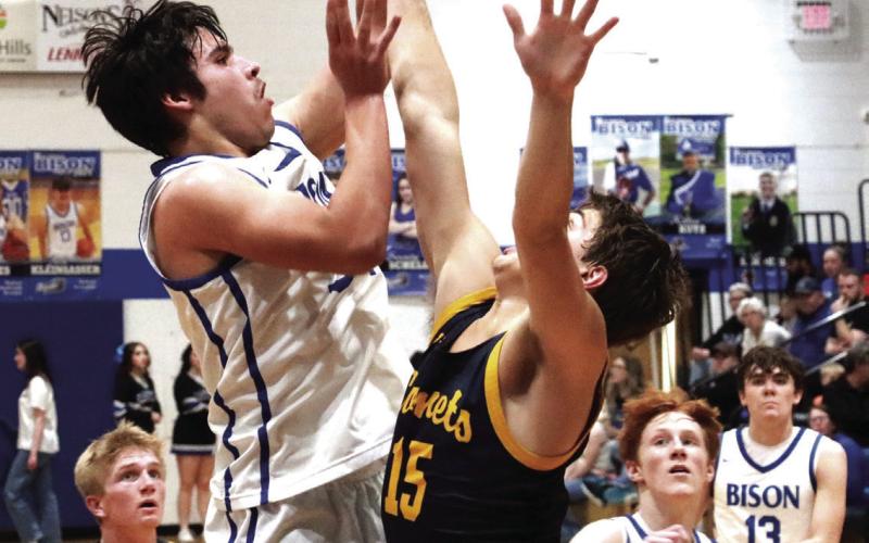 Hot Springs junior Aidyn Janis puts up a contested shot in the lane against Rapid City Christian last Friday night at Case Auditorium. Photo by Brett Nachtigall/Fall River County Herald-Star