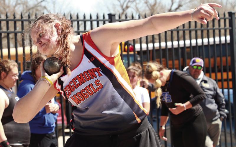 Edgemont junior Hadley Hollenbeck gets set to launch the shot put during last week’s Track-O-Rama. She is currently ranked sixth in the state’s Class “B” standings after throwing a PR last week and placing sixth overall at the meet. Photo by Brett Nachtigall/Fall River County Herald-Star