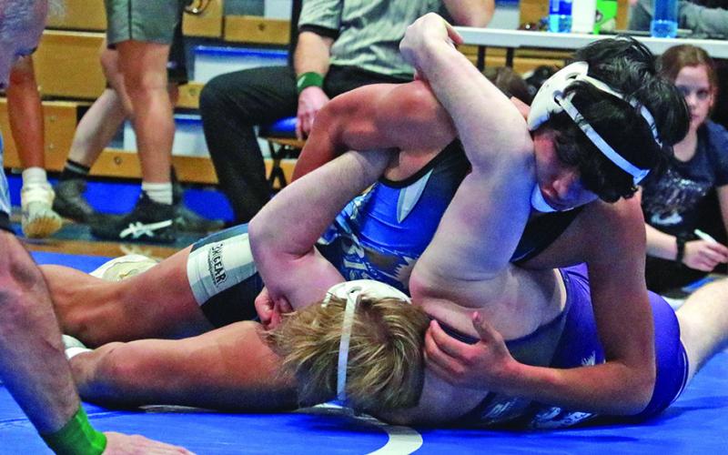 Hot Springs sophomore Jayden White Face nearly got a pin in this Black Hills Conference match versus a Belle Fourche wrestler. Photo by Brett Nachtigall/Fall River County Herald-Star