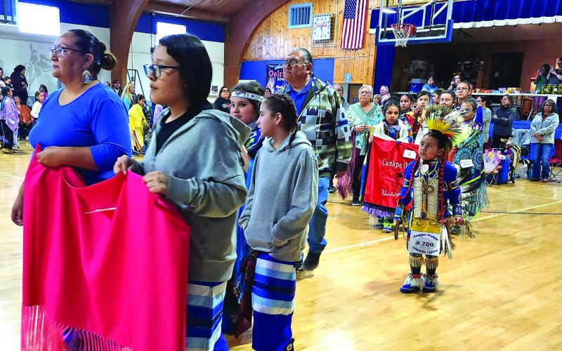 The Oelrichs dancers, Ashlynn Red Cloud, Naomi Phelps-Herman, Ta’Sina New Holy, and Eli Black Bear, during the Grand Entry, led by Jessica Eagle Hawk, co-organizer of the event. More dancers arrived throughout the afternoon. Photos by Katie Merdanian/Fall River County Herald-Star