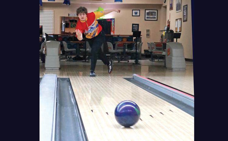 Hot Springs sophomore Braden Yeager rolls a ball towards the pins at the Winner’s Circle recently, in preparation for his upcoming trip to the juniors national tournament in Detroit this summer. Photo by Brett Nachtigall/Fall River County Herald-Star